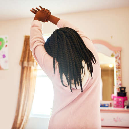After a nights rest stretching is important. Rearview shot of an unrecognizable little girl...