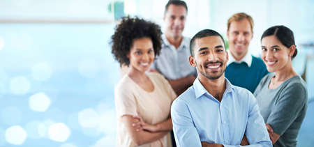 Proud of my teams achievements. Cropped portrait of a group of diverse colleagues standing in their...