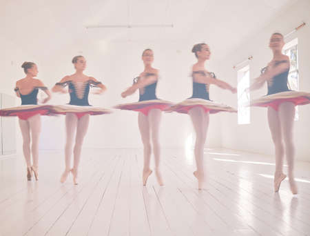 Ballet dancers, fitness and women training, learning and dancing at an open studio hall space. Healthy, workout and talented ballerina girls with energy, jumping and balance to master a creative artの写真素材