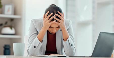 Headache, stress and worried young businesswoman tired from getting bad news about company...
