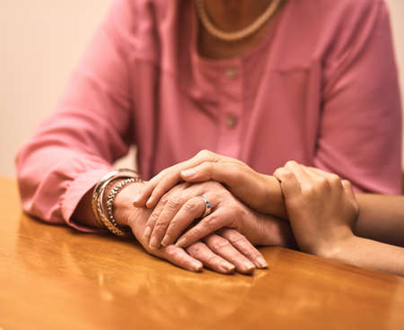 You have nothing to worry about. two unrecognizable people holding hands.