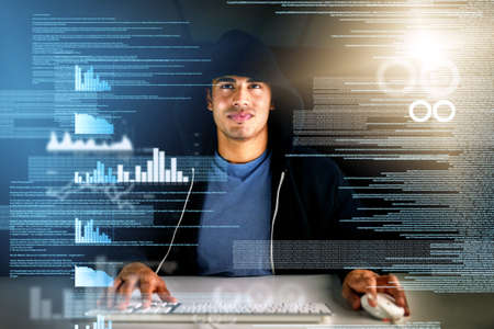 You can do all kinds of things with code. a handsome young male computer programmer working on new...
