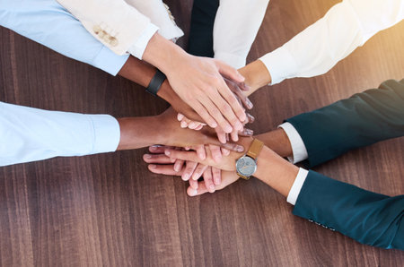 Community, teamwork and support by hands united in support of global mission or team building....