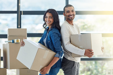 Were going to make this place our home. Portrait of a happy young couple moving into their new home...