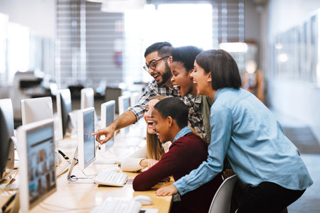 Look at that. university students checking out social media platforms on campus.の写真素材