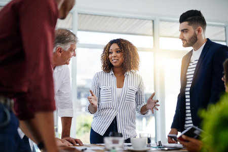 Creativity and productivity leads to success. creative employees working in a modern office.