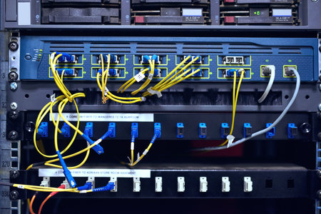 Connecting everyone. the inside of a computer with all of its wiring located in a server room.