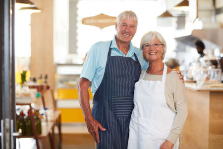 Theres no stopping us now. Portrait of a senior couple running a small business together.の写真素材