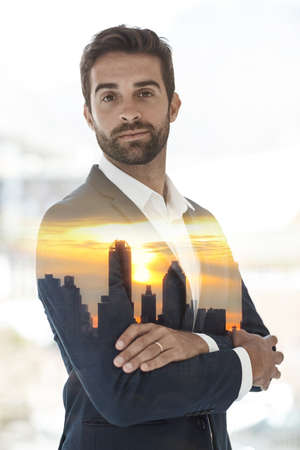 Dress for the job you want. Cropped portrait of a handsome young businessman superimposed on a...