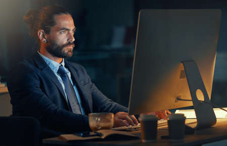 Tech, software and computer web design worker working at night on cyber security, programming or...