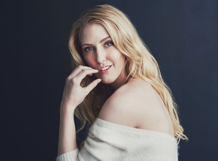 Beauty so mesmerising. Studio portrait of a beautiful young woman isolated on black.