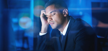 Tired, sleeping and burnout for night worker, latino business man or company employee. Stress,...
