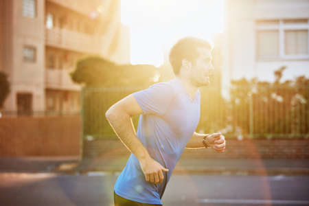 Runnings perfect for any fitness level. a sporty young man out for a run.