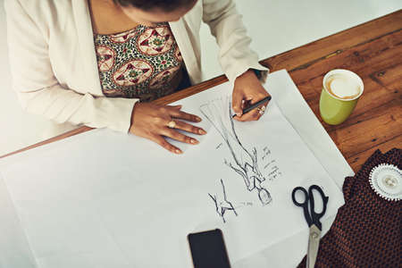 Its a form of wearable art. a fashion designer working on a new design.