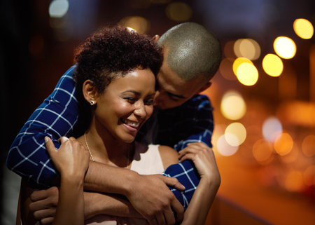 You are my everything. an affectionate young couple out on a date in the city.