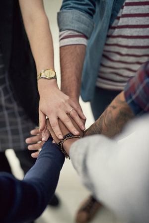 Were committed to teamwork. a group of designers coming together as one.