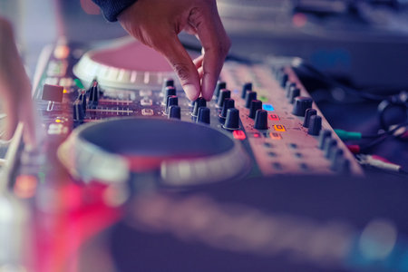 Ready to rock some party beats. Closeup shot of a DJ mixing music on a turntable.
