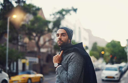 Out in the city. a fashionable young man out in the city.の写真素材