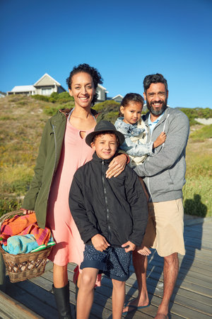 They give our lives more meaning. a family of four spending the day outdoors.