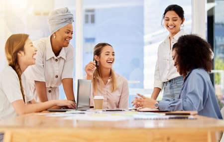 Business women planning social media empowerment campaign or creative strategy meeting for teamwork,...