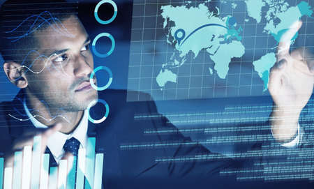 IT businessman with futuristic infographic of global chart, big data analytics or international...