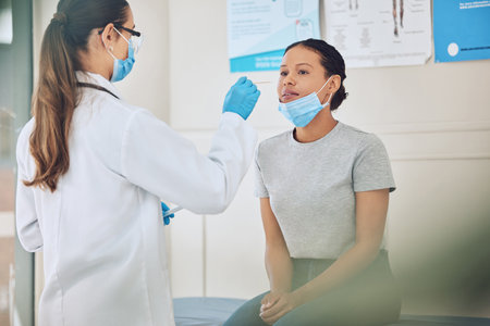 Doctor or nurse doing covid test in a medical research facility with with cotton swab. A healthcare...