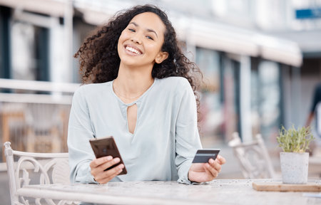 Online shopping, phone and woman doing digital credit card payment via internet at a restaurant....
