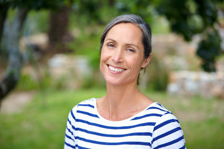 Living life to the full. Cropped portrait of an attractive mature woman in casualwear standing...