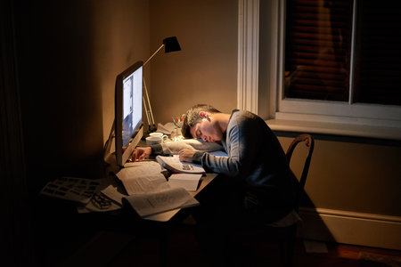 Quit slackin and make things happen. a young student studying late into the night.