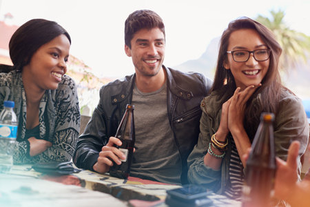 Friends always ready to listen. a group of friends drinking outdoors.