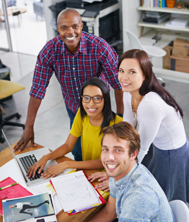 Bringing your ideas into focus. a young designers at work in an office.