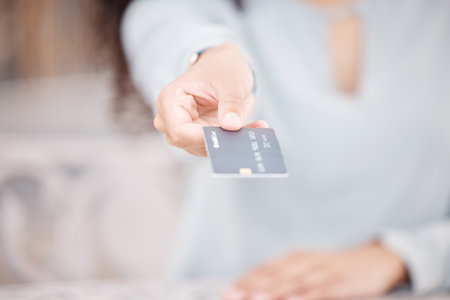 Hand of woman with credit card, money or finance, payment or purchase. Investment, buying goods or...