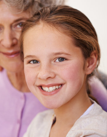 My grans always been there for me. Portrait of a young girl sitting with her grandma.