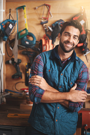 Theyre more than tools in the hands of a craftsmen. Portrait of a man standing in his workshop.