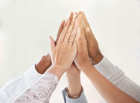 Hands, teamwork high five and collaboration success after winning partnership in startup meeting. Winner team, trust and working in support on mission, vision or target goal motivation for business.の写真素材