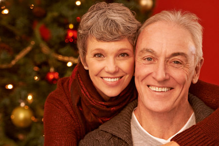 A time for appreciating loved ones. A cropped portrait of a happy senior couple in front of a Christmas tree.の写真素材