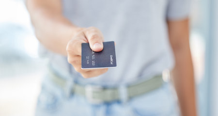Woman hands giving credit card for money, finance and payment for shopping, capital investment and trade. Closeup of customer, commerce wealth and banking exchange from atm account for sales economyの写真素材
