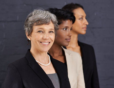 And i still got this...three businesswomen standing in a row.の写真素材