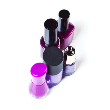 Add some purple into your beauty. Studio shot of colorful nail varnish bottles.の写真素材