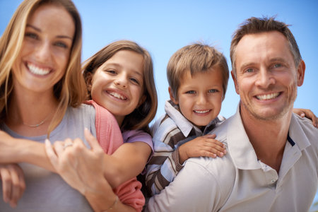 Special times together. Closeup portrait of an affectionate family on holiday.の写真素材