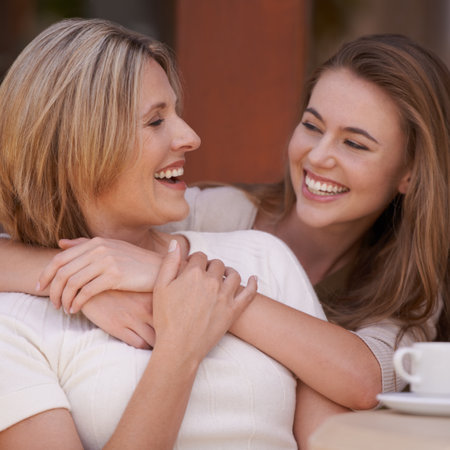 You really are so beautiful. A mother and daughter being affectionate towards each other.の写真素材