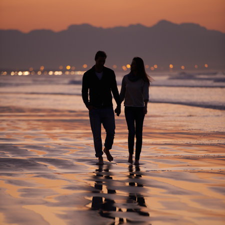 Theres nothing like young love. a young woman at the beach.の写真素材