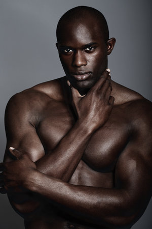 Hes got the look. A handsome and muscular young man posing in the studio.の写真素材