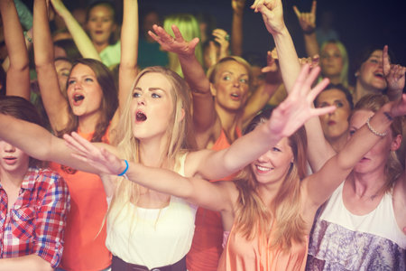 When the bass drops. a crowd at a music festival.