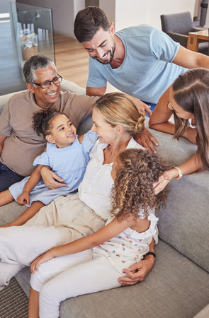 Happy interracial family bonding with their children and grandparents at home. Adults and their kids...