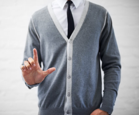 His hands are at your disposal. Cropped image of an unrecognizable businessman making a hand gesture.の写真素材
