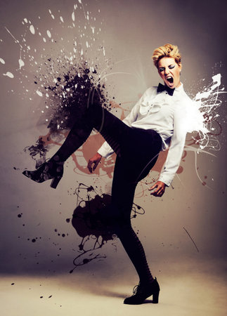 Making a splash. Studio shot of a fashion model that is digitally enhanced.の写真素材