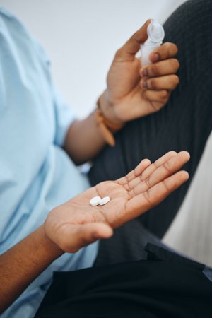 Man hands, medicine pills and medical tablet treatment for sick, healthcare and pharmaceutical drugs help. Closeup person daily capsules of antibiotics, wellness vitamins and pain healing supplementsの写真素材
