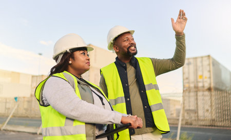 Logistics, tablet and black team at cargo, container or industrial shipping site for product shipment distribution. Supply chain, freight delivery or happy man and woman consulting on export progressの写真素材