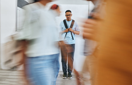 Bullying, depression and sad university student, black man and mental health problems in busy...